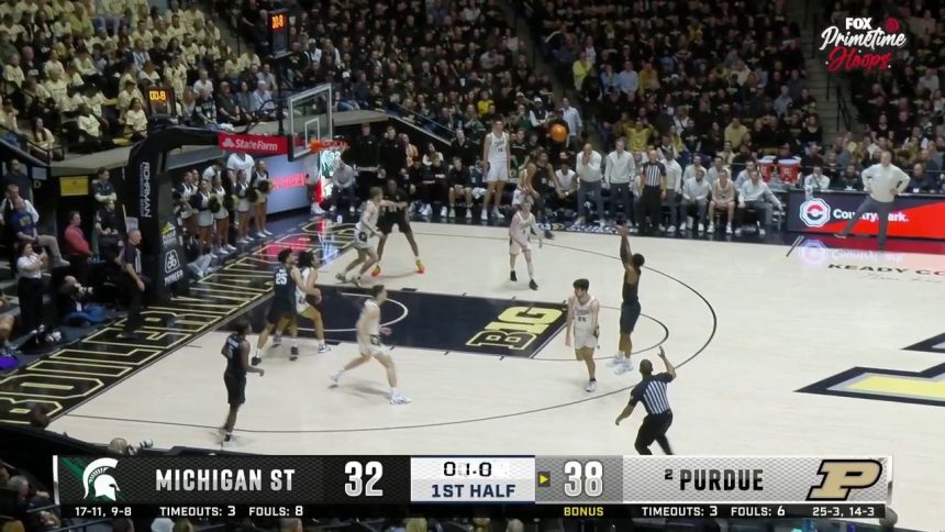 Michigan State's Tyson Walker drills a buzzer-beater heading into halftime vs. Purdue