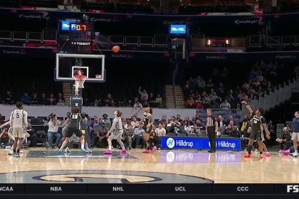 Providence's Rich Barron drills a buzzer-beating 3-pointer to end the first half with a 30-26 lead vs. Georgetown