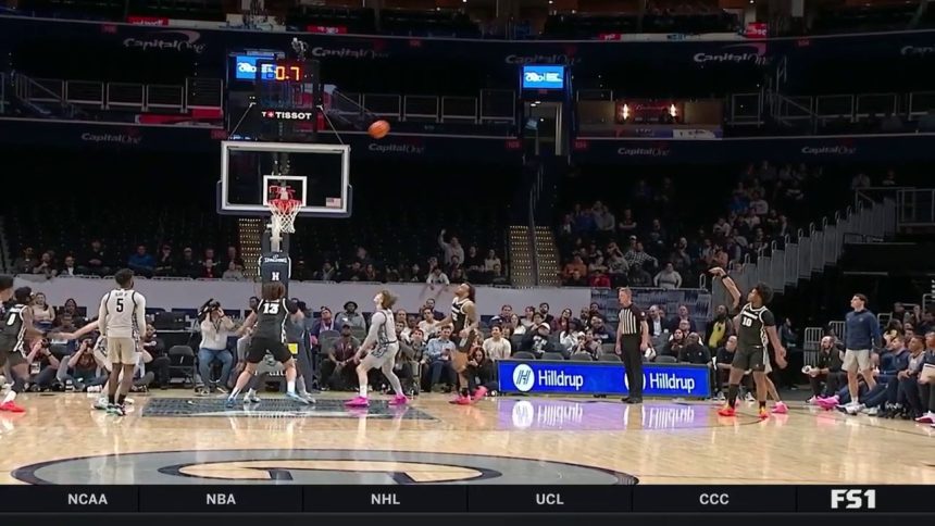 Providence's Rich Barron drills a buzzer-beating 3-pointer to end the first half with a 30-26 lead vs. Georgetown