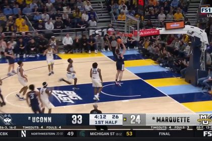 Stephon Castle finds Alex Karaban on the break for a strong two-handed slam to extend UConn's lead over Marquette