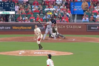 Rafael Devers drives a solo home run to center field to even the score between the Red Sox and Cardinals