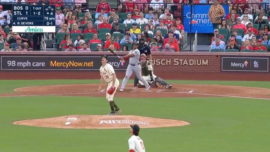 Rafael Devers drives a solo home run to center field to even the score between the Red Sox and Cardinals