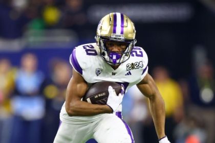 UW RB Rogers, charged with rape, off team