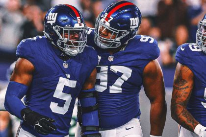 Front-loaded: Giants happily putting heavy pressure on their four-man D-line