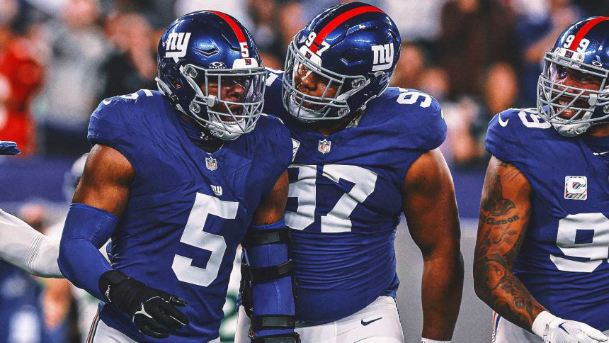 Front-loaded: Giants happily putting heavy pressure on their four-man D-line