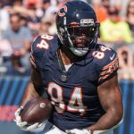 TE Lewis re-signs with Bears for 19th NFL season