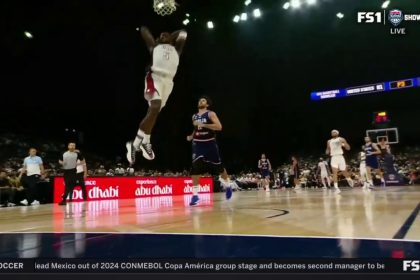 United States' Anthony Edwards comes away with a steal and finishes with a dunk vs. Serbia