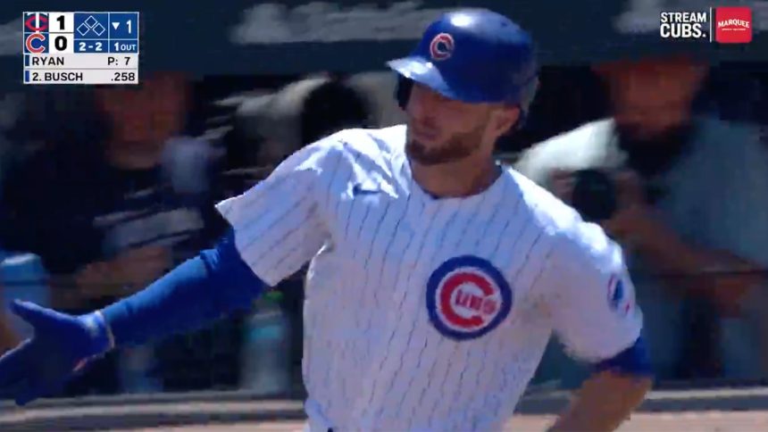 Cubs' Michael Busch launches a solo shot to right field, this one coming in the bottom of the 1st inning vs. the Twins