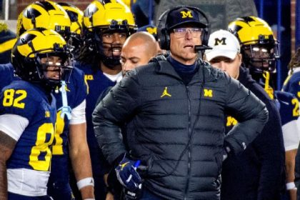 Harbaugh no longer Michigan's honorary captain