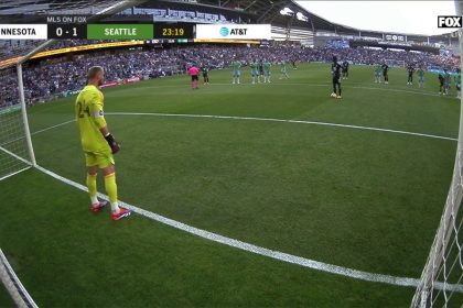 Minnesota's Kelvin Yeboah scores on a penalty kick to even the score against Seattle