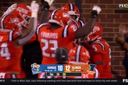 Xavier Scott gets the interception and takes it 30 yards for the TD, giving Illinois a lead over Kansas