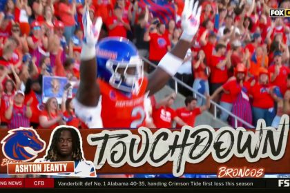 Ashton Jeany rushes for his third touchdown of the game, extending Boise State's lead over Utah State