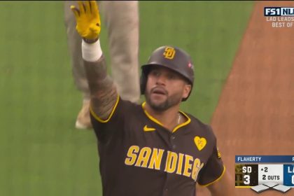 Padres' David Peralta smacks a long home run to center field, a two-run blast against the Dodgers