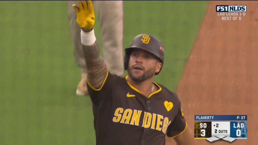 Padres' David Peralta smacks a long home run to center field, a two-run blast against the Dodgers