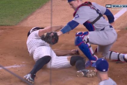 Teoscar Hernández executes an amazing throw to nail Giancarlo Stanton at the plate