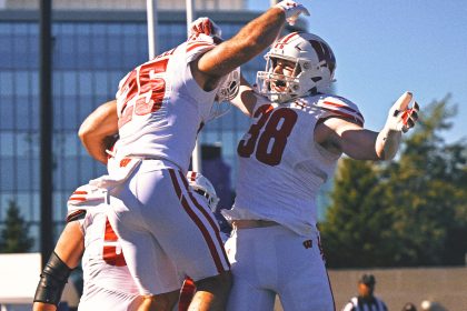 Wisconsin strength coach jumps into Lake Michigan after win at Northwestern