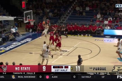 Camden Heide throws down the alley-oop in transition, extending Purdue's lead over NC State