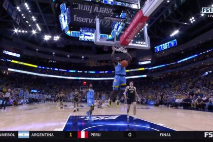 Chase Ross gets the steal and throws down a two-handed jam as Marquette leads 18-15 over Purdue