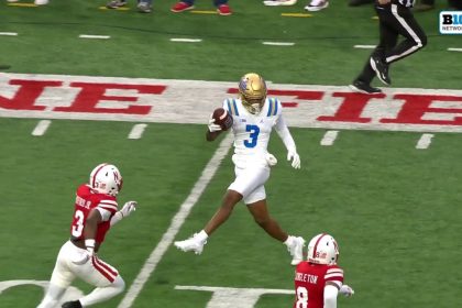 Ethan Garbers links with Kwazi Gilmer on a 48-yard touchdown pass to extend UCLA's lead to 27-7 over Nebraska