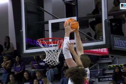 Matthew Nicholson throws down a two-handed slam to help Northwestern lead over UIC going into the half