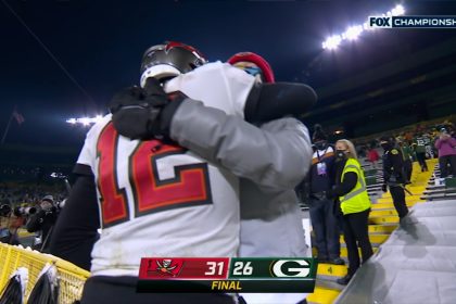 Tom Brady hugs his son after winning the 2021 NFC Championship