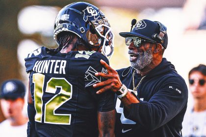 Colorado star Travis Hunter says coach Deion Sanders isn't going anywhere