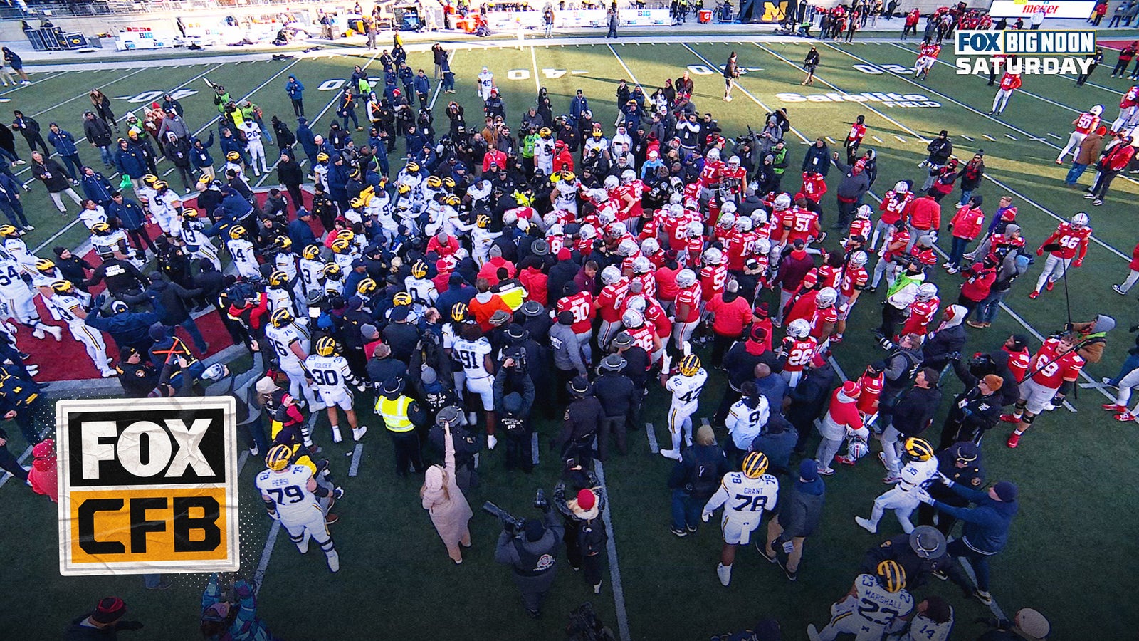 Massive SCUFFLE ensues after Michigan tries to plant flag on Ohio State's logo