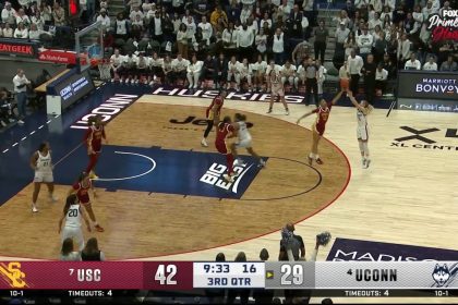 Juju Watkins blocks Paige Bueckers and lays it up on the other end, extending USC's lead vs. UConn