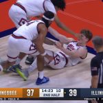 Kasparas Jakučionis drills a 3-pointer through contact, extending Illinois' lead over Tennessee