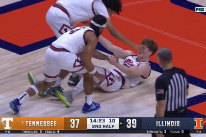 Kasparas Jakučionis drills a 3-pointer through contact, extending Illinois' lead over Tennessee