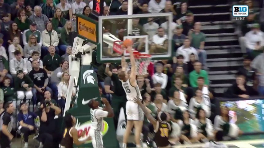 Michigan State's Carson Cooper throws down two-handed alley-oop to extend lead over Western Michigan