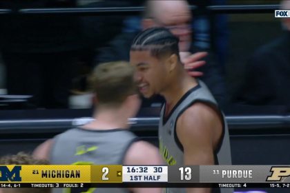 C.J. Cox finishes a layup and nails a 3-pointer off of back-to-back steals, extending Purdue's lead vs. Michigan