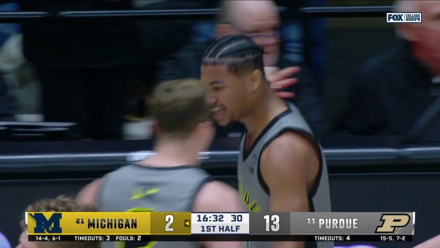 C.J. Cox finishes a layup and nails a 3-pointer off of back-to-back steals, extending Purdue's lead vs. Michigan