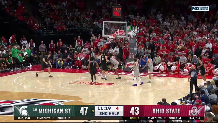 Coen Carr throws down strong two-handed dunk to extend Michigan State's lead over Ohio State