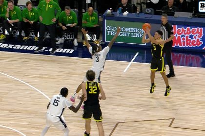 Jackson Shelstad drains a three-pointer from downtown as Oregon leads Penn State 52-51