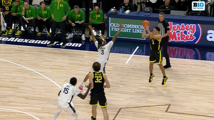 Jackson Shelstad drains a three-pointer from downtown as Oregon leads Penn State 52-51