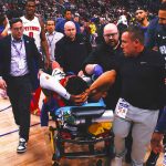 Pistons guard Jaden Ivey stretchered off with severe leg injury against Magic