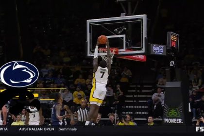 Seydou Traore throws down an alley-oop off an inbound pass to extend Iowas lead over Penn State