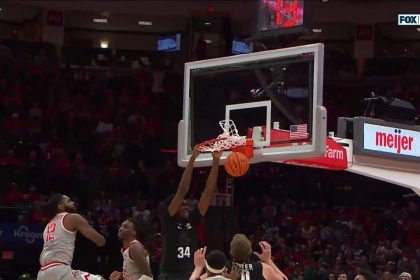 Xavier Booker slams down ferocious two-handed dunk to seal Michigan State's 69-62 victory over Ohio State