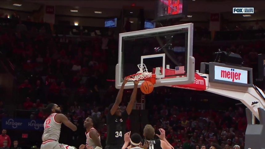 Xavier Booker slams down ferocious two-handed dunk to seal Michigan State's 69-62 victory over Ohio State