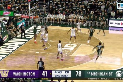 Xavier Booker throws down strong two-handed alley-oop to seal Michigan State's 88-54 win over Washington