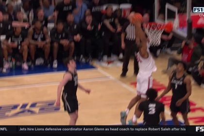 Zuby Ejiofor throws down strong dunk for St. John's after phenomenal save from Kadary Richmond to shrink Xavier's lead