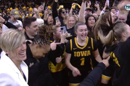 Iowa fans storm Carver-Hawkeye Arena after upsetting JuJu Watkins, No. 4 USC Trojans on Caitlin Clark's jersey retirement day