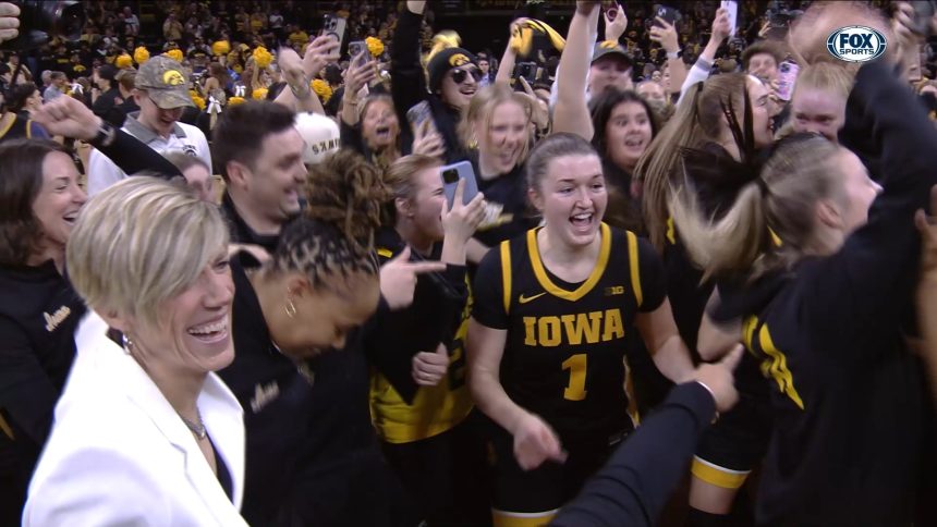 Iowa fans storm Carver-Hawkeye Arena after upsetting JuJu Watkins, No. 4 USC Trojans on Caitlin Clark's jersey retirement day