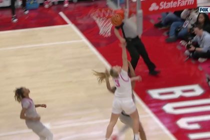 Iowa's Sydney Affolter makes an and-1 off of a fast break, trimming the Ohio State lead