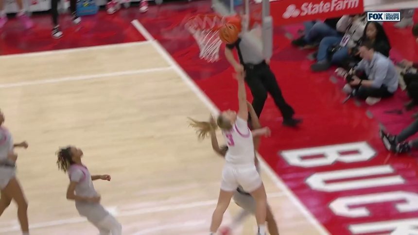 Iowa's Sydney Affolter makes an and-1 off of a fast break, trimming the Ohio State lead