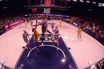 Jordan Harrison makes an and-1 layup, extending West Virginia's lead over Kansas State