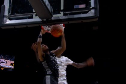 Cincinnati's Dillon Mitchell rises for a fastbreak flush vs. UCF