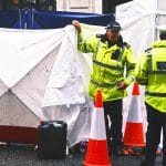 Liverpool soccer parade suspect still in custody, wounded number 'nearly 80'