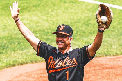 Jim Harbaugh gives advice after foul ball misses his brother and Cal Ripken Jr.